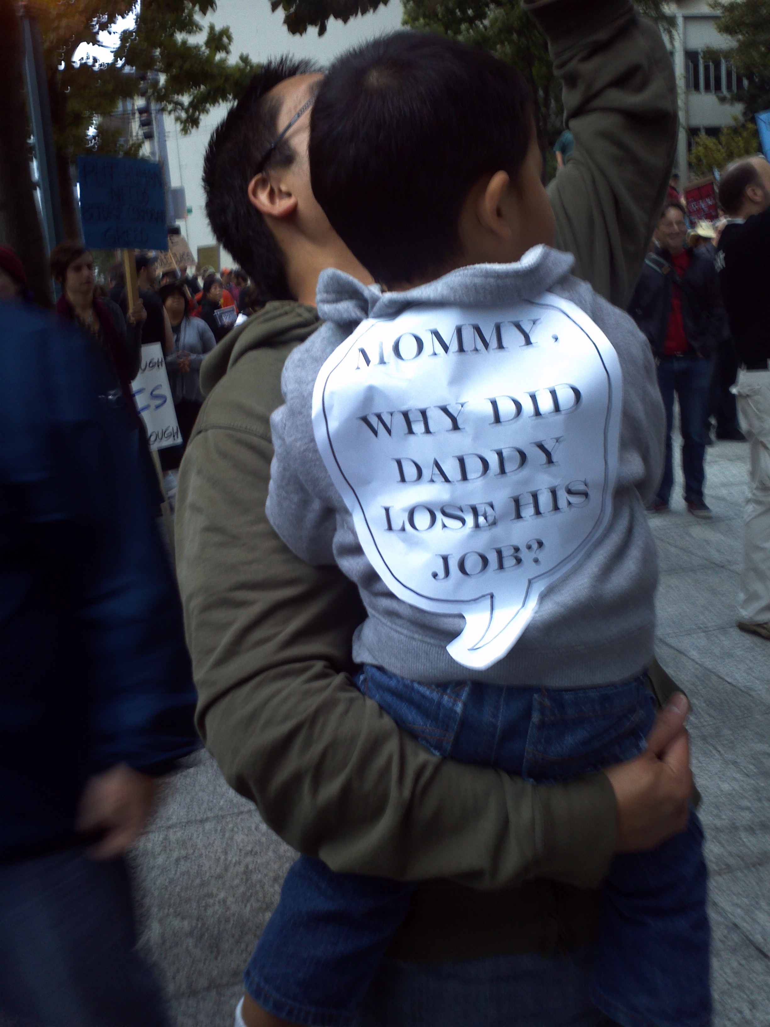 Father & Son at Westlake Plaza during the Occupy Seattle! Rally & March on Saturday 8 October 2011. Foto by William Bass.