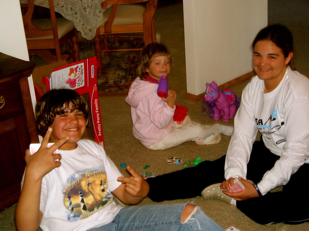 Her Bass Cousins. L2R: Jessie, Alli, Lydia. Rice, VA. April 2007.