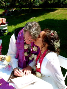 Signing the Certificate of Marriage & sealed with a kiss.