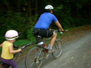 Now she's pedaling! Go, Faster, Daddy! Faster!