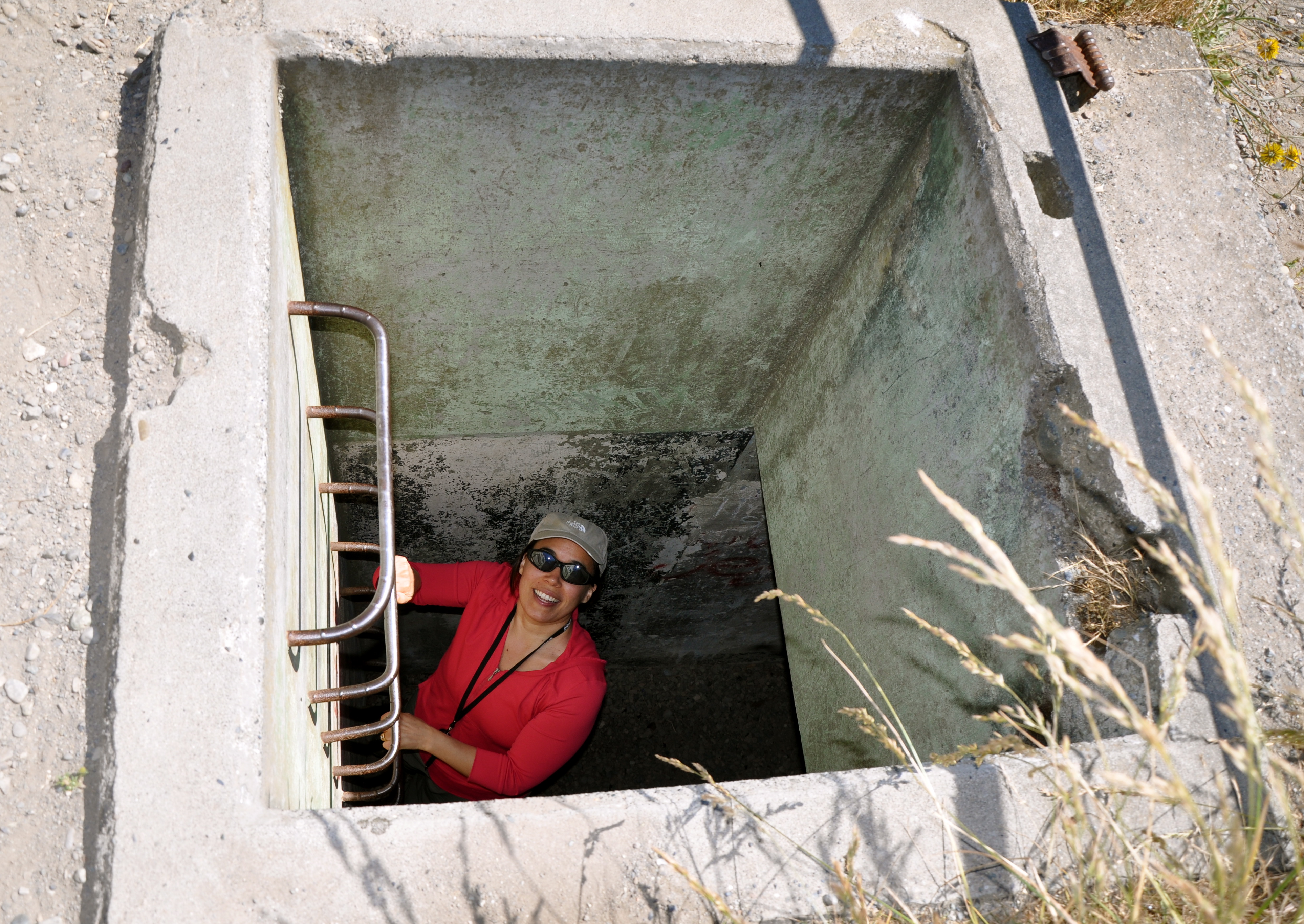 Kristina climbing into the old bunkers of Fort Ebey on Whidbey Island. Monday 4 July 2011.