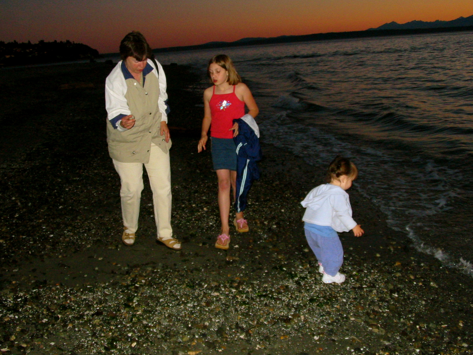 Down on the shores of Carkeek Park; L2R: Jean, Morgan, Talia, & the Salish Sea.